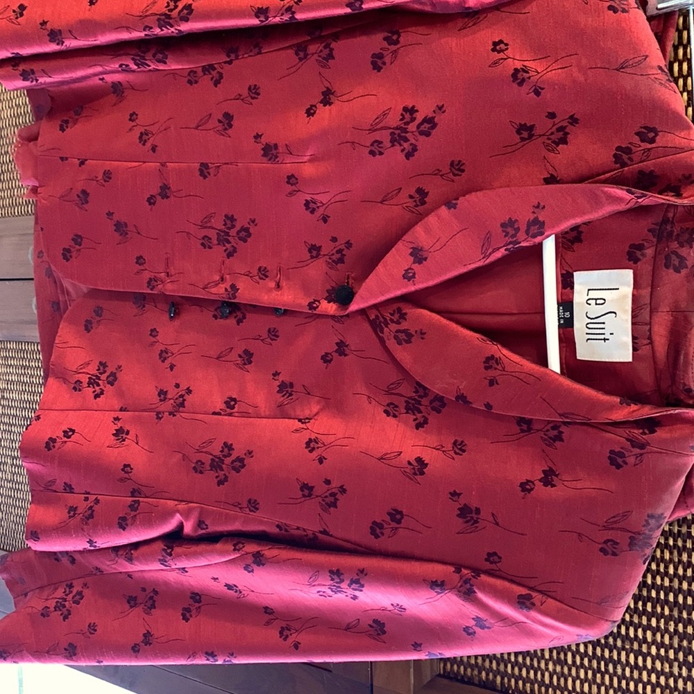 Gorgeous red suit, perfect the high-powered executive, makes a statement